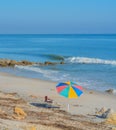 A Umbrella On The Beach  Of The Atlantic Ocean, At Marineland Beach In Marineland, Flagler County, Florida