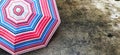 Umbrella on cement floor after rain. Royalty Free Stock Photo