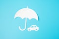 Umbrella cover Car paper on blue background. Warranty, Maintenance, Vehicle and insurance concept Royalty Free Stock Photo