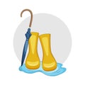 Umbrella and cute yellow rubber boots in the puddle stock vector illustration. Royalty Free Stock Photo