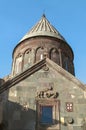 Umbrella dome of the Katoghike Church in the Geghard monastery with a round drum framed by carved arches with Windows and covered