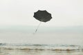 Umbrella flying in the sky, concept of solitude and freedom