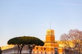 umbrella pine trees in front of castle in mediterranean architecture in rome italy with blue sky at sunset Royalty Free Stock Photo