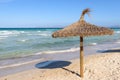 Umbrella at the Playa de Muro beach in Mallorca Royalty Free Stock Photo