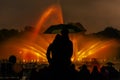 umbrella protection against rain during the fountain show