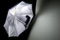 Umbrella reflector with flash gun Royalty Free Stock Photo