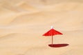 Umbrella in the sand. Summer travel theme concept