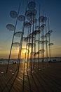 Umbrella sculpture on the promenade of Thessaloniki in the sunset