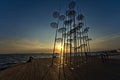 Umbrella sculpture on the promenade of Thessaloniki in the sunset