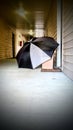 Umbrella sheilds package in apartment breezeway