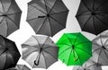 Umbrella standing out from the crowd unique Royalty Free Stock Photo