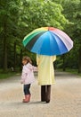 Umbrella stroll Royalty Free Stock Photo