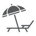 Umbrella and sun lounge glyph icon, travel Royalty Free Stock Photo