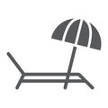 Umbrella and sun lounger glyph icon, summer and parasol, beach bed sign vector graphics, a solid icon on a white Royalty Free Stock Photo