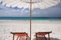 Umbrella and twin chairs Royalty Free Stock Photo