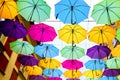 Umbrellas in the air . bright small streets of the city Royalty Free Stock Photo