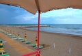 umbrellas on the beach without people from the lifeguard tower Royalty Free Stock Photo