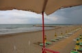 Umbrellas on the beach without people from the lifeguard watchin Royalty Free Stock Photo