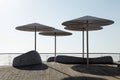 Umbrellas on beach promenade of Tel Aviv, Israel Royalty Free Stock Photo