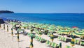 Umbrellas beach in the summer day. Tropea, southern Italy Royalty Free Stock Photo