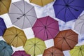 Umbrellas against a cloudy sky Royalty Free Stock Photo