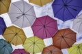 Umbrellas against a cloudy sky