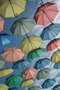 Umbrellas of different colors in the sky