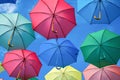 Umbrellas of different colors in the sky