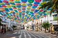 Umbrellas floating in the sky with lots of color in ÃÂgueda, Portugal