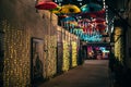 the umbrellas are hanging down over a street at night