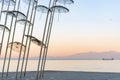 The `Umbrellas` installation at the New Waterfront of Thessaloniki during sunrise in Greece Royalty Free Stock Photo