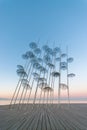 The `Umbrellas` installation at the New Waterfront of Thessaloniki during sunrise in Greece Royalty Free Stock Photo