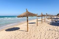Umbrellas at the Playa de Muro beach in Mallorca Royalty Free Stock Photo