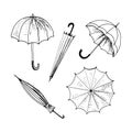 Umbrellas set. Collection of isolated sketchy style umbrellas. Doodle umbrellas in black and white. Hand drawn vector