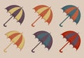 Umbrellas set of icons, vintage style. Beach multicolored umbrella retro collection of design elements. Vector