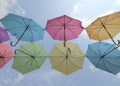 Multi color umbrellas in the sky