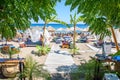 Umbrellas, sun beds and holiday-makers on Stegna beach RHODES, GREECE Royalty Free Stock Photo