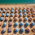 umbrellas and sunbeds top view the sandy beach Royalty Free Stock Photo