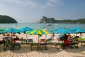 Umbrellas and sunchairs at Ao Loh Dalum beach on Phi Phi Don Isla Royalty Free Stock Photo
