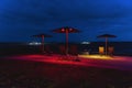 Umbrellas at the viewpoint of the Hambach brown coal mine at night, in Elsdorf, Germany Royalty Free Stock Photo