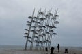 Umbrellas at the beach, sculpture of Giorgos Zongolopoulos Royalty Free Stock Photo