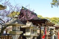 Ume Blossoms and Main Building in Kitano Tenmangu Shrine, the Tablet with Shrine`s name, Kyoto, Royalty Free Stock Photo