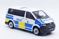 Worn police van, model in scale against a white background