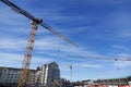 four cranes during housing construction on Teg