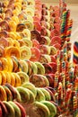 Large and very many lollipops placed on a wall in candy store