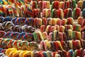 Many different lollipops mounted on a wall in a candy store