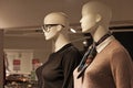 Two mannequins wearing the latest autumn fashion and glasses