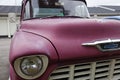 Old beautiful pink pickup in the parking lot Royalty Free Stock Photo