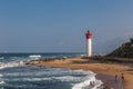 Umhlanga Rocks, South Africa, August 5, 2017: View along the beach towards the lighthouse