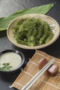 Umi-budou Seaweed or Green Caviar Healthy sea food or sea grapes seaweed on plate Royalty Free Stock Photo